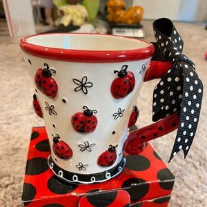 Burton raised lady bug pattern mug